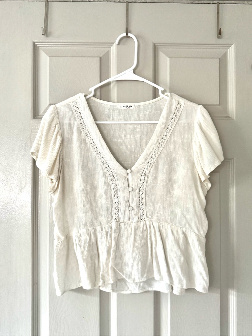 Lightweight Cream V-Neck Peplum Top